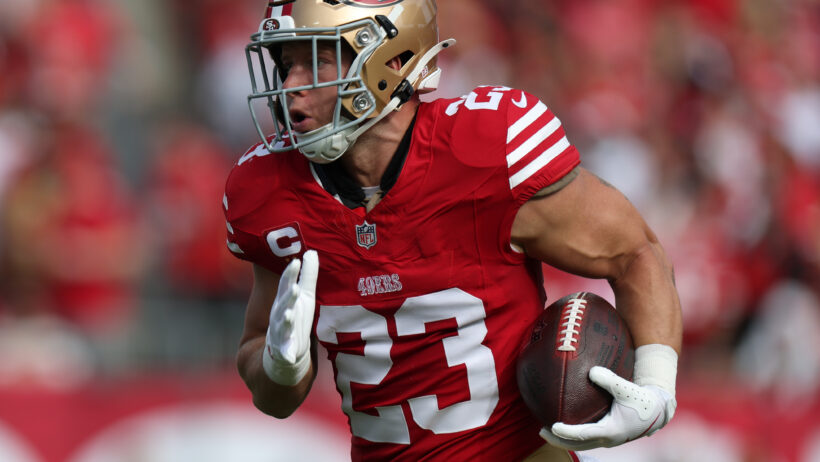 Christian McCaffrey runs the ball