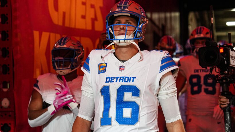 Jared Goff leads the Lions out of the tunnel.