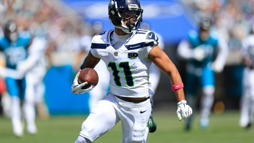 Seattle Seahawks wide receiver Jaxon Smith-Njigba running with the ball