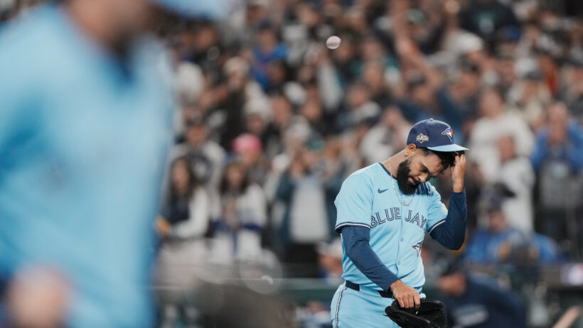Toronto Blue Jays pitcher Seranthony Dominguez walks off the mound dejected