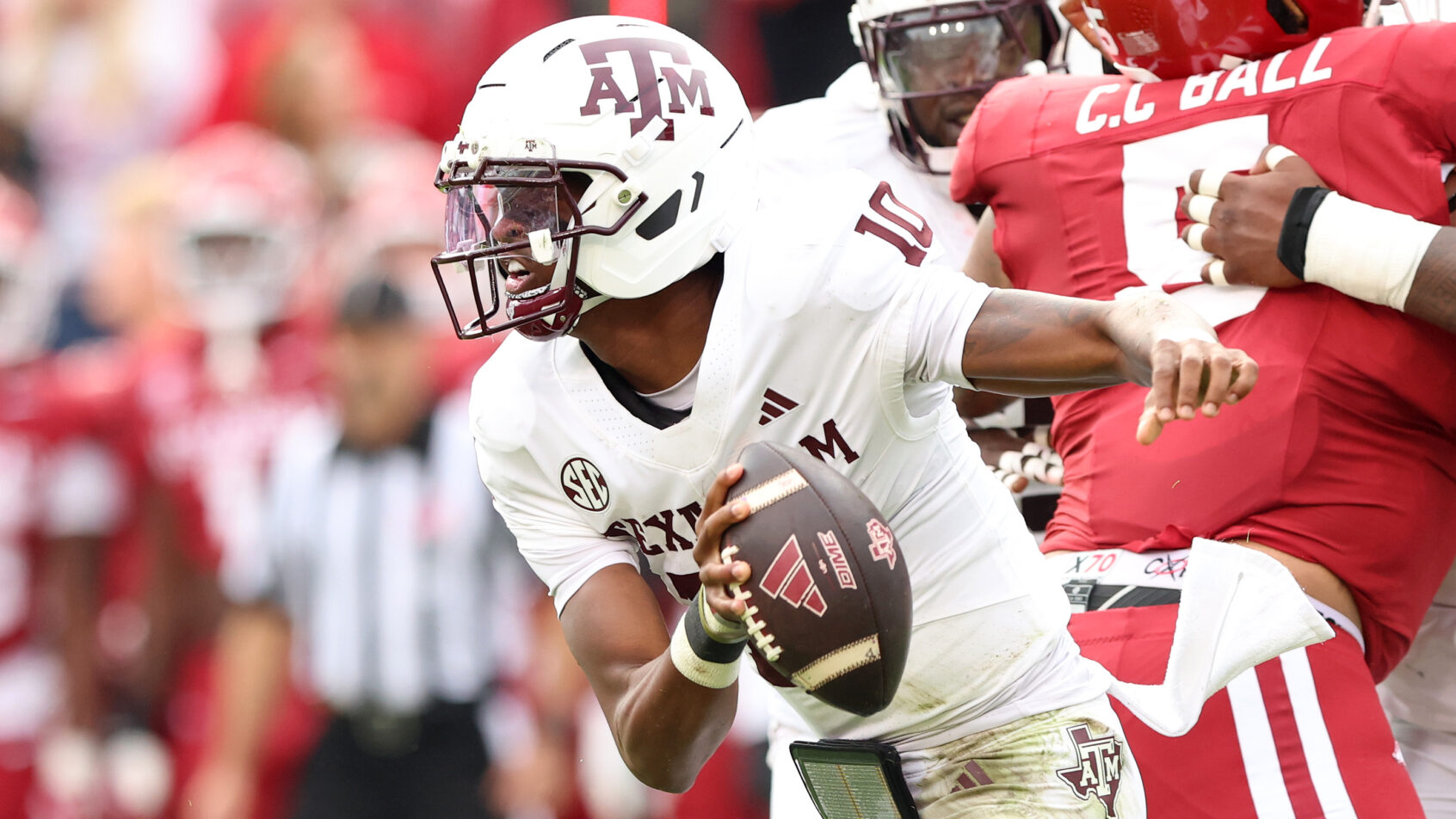 Texas A&M Aggies quarterback Marcel Reed rushes the ball