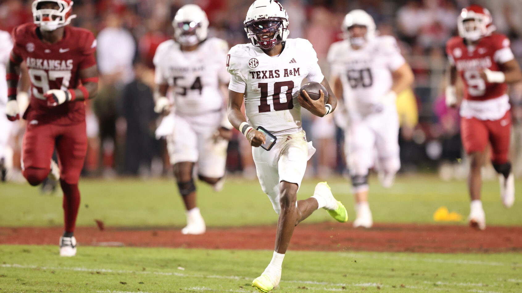 Texas A&M Aggies quarterback Marcel Reed running with the football