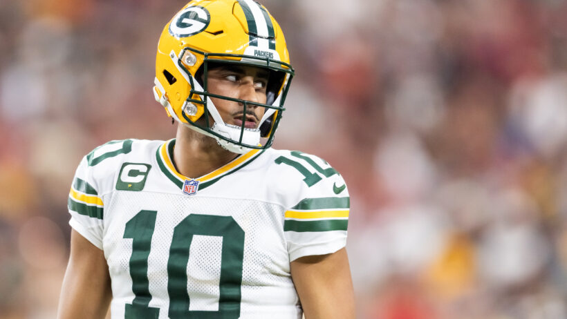 Green Bay Packers quarterback Jordan Love looking over his shoulder
