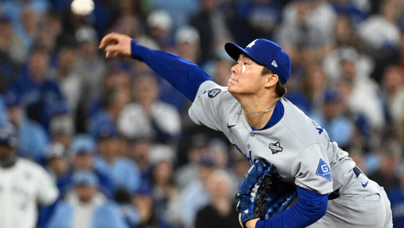 Yoshinobu Yamamoto delivers a pitch vs the Blue Jays in Game 6 of the World Series.