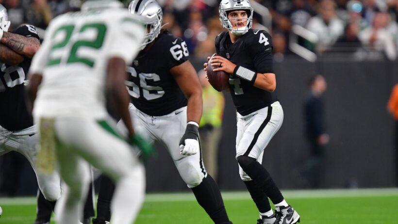 Las Vegas Raiders quarterback Aidan O’Connell looks to pass