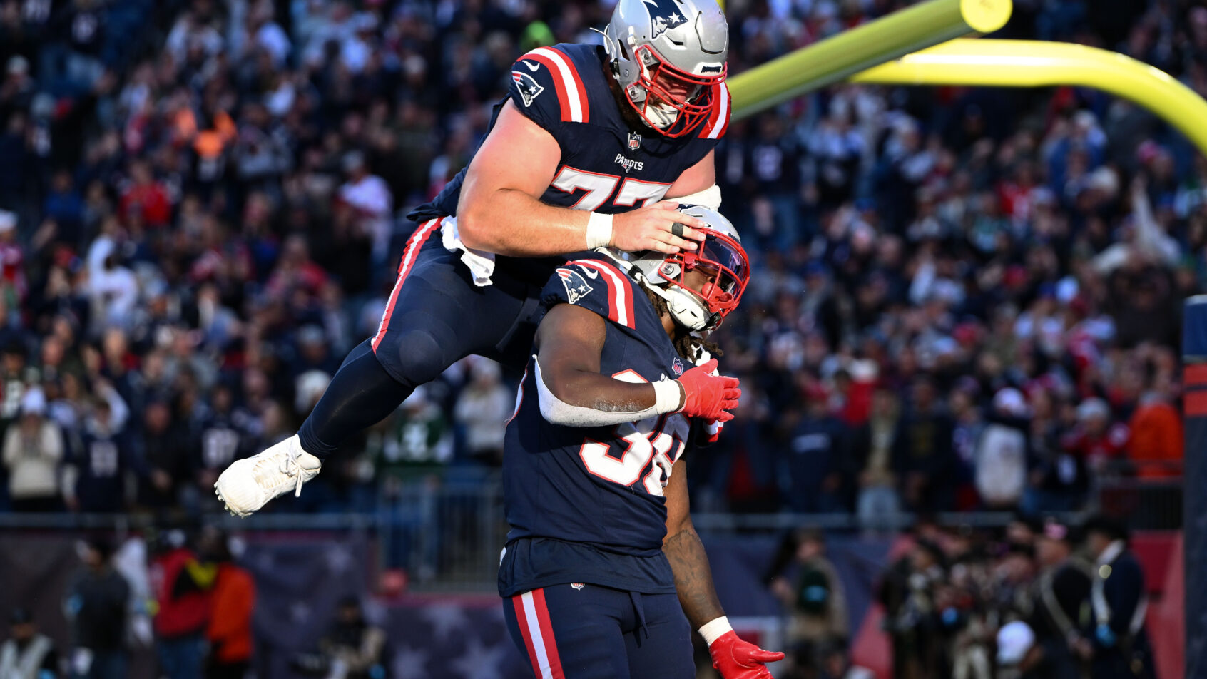 New England Patriots running back Rhamondre Stevenson celebrates a TD against the New York Jets