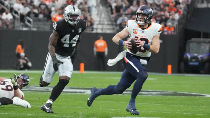 Denver Broncos quarterback Bo Nix runs with the ball against the Las Vegas Raiders