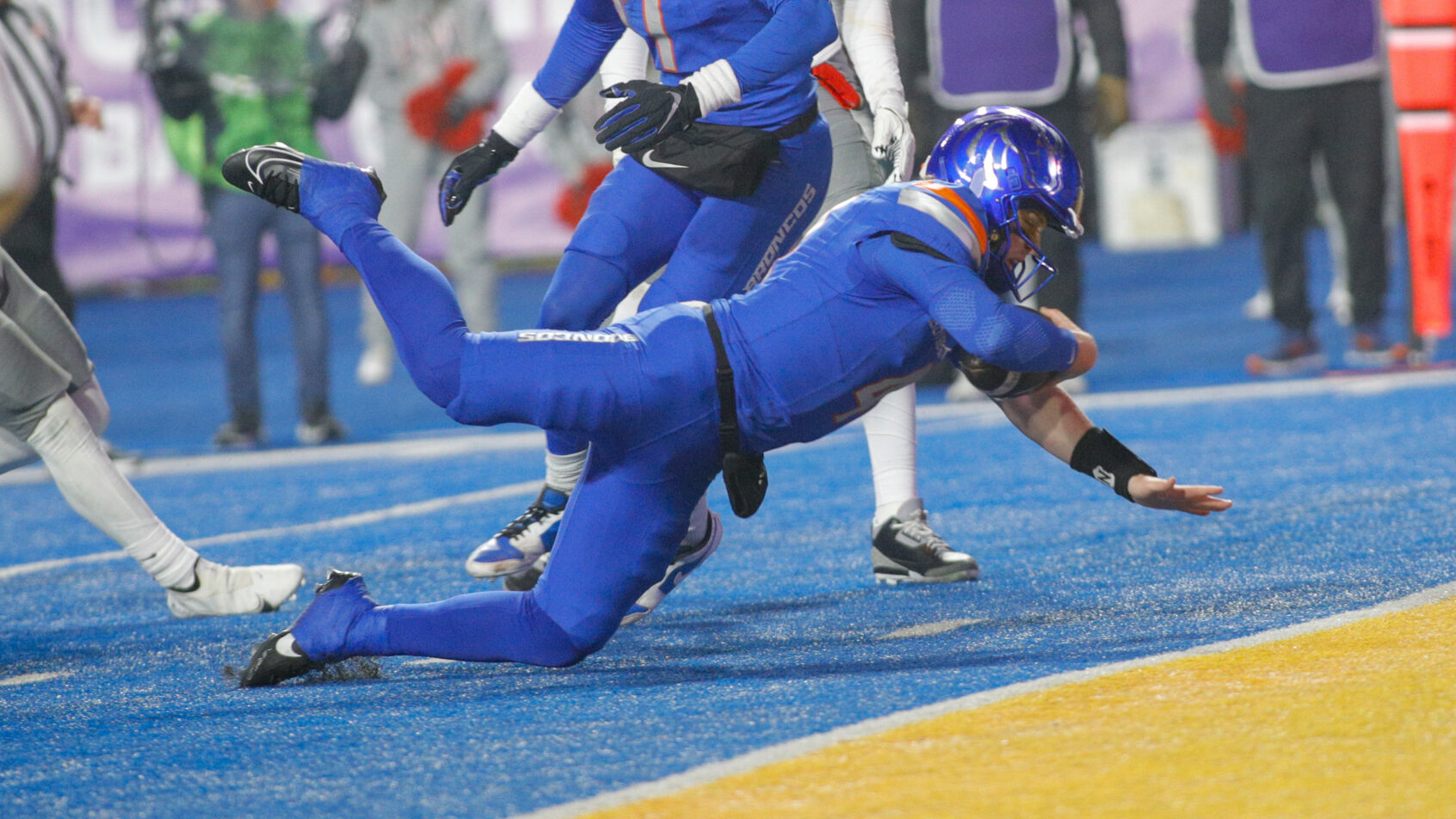 Boise State Broncos quarterback Maddux Madsen dives for the end zone