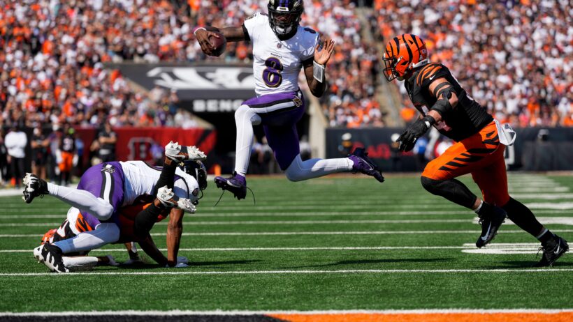 Baltimore Ravens quarterback Lamar Jackson scoring a TD against the Cincinnati Bengals