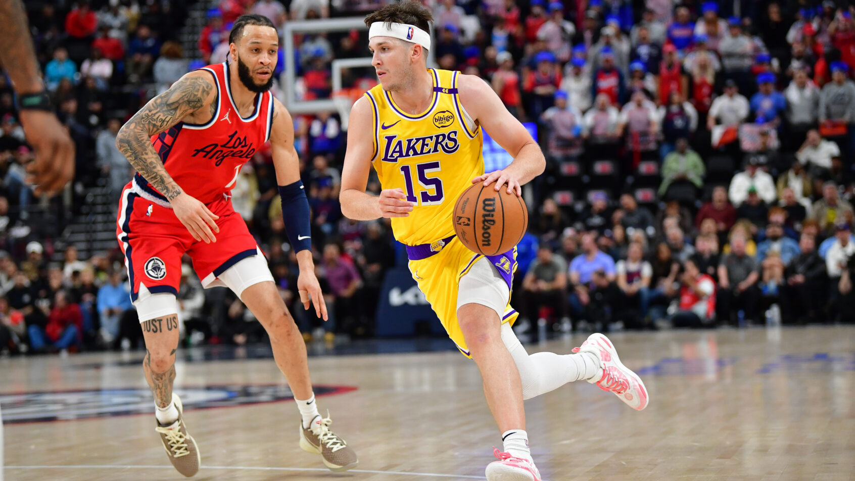 Los Angeles Lakers guard Austin Reaves dribbles against the LA Clippers