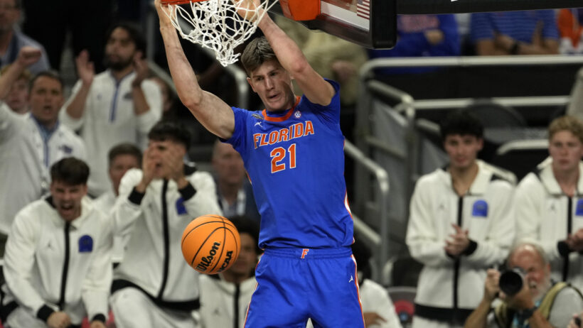 Florida Gators forward Alex Condon dunking
