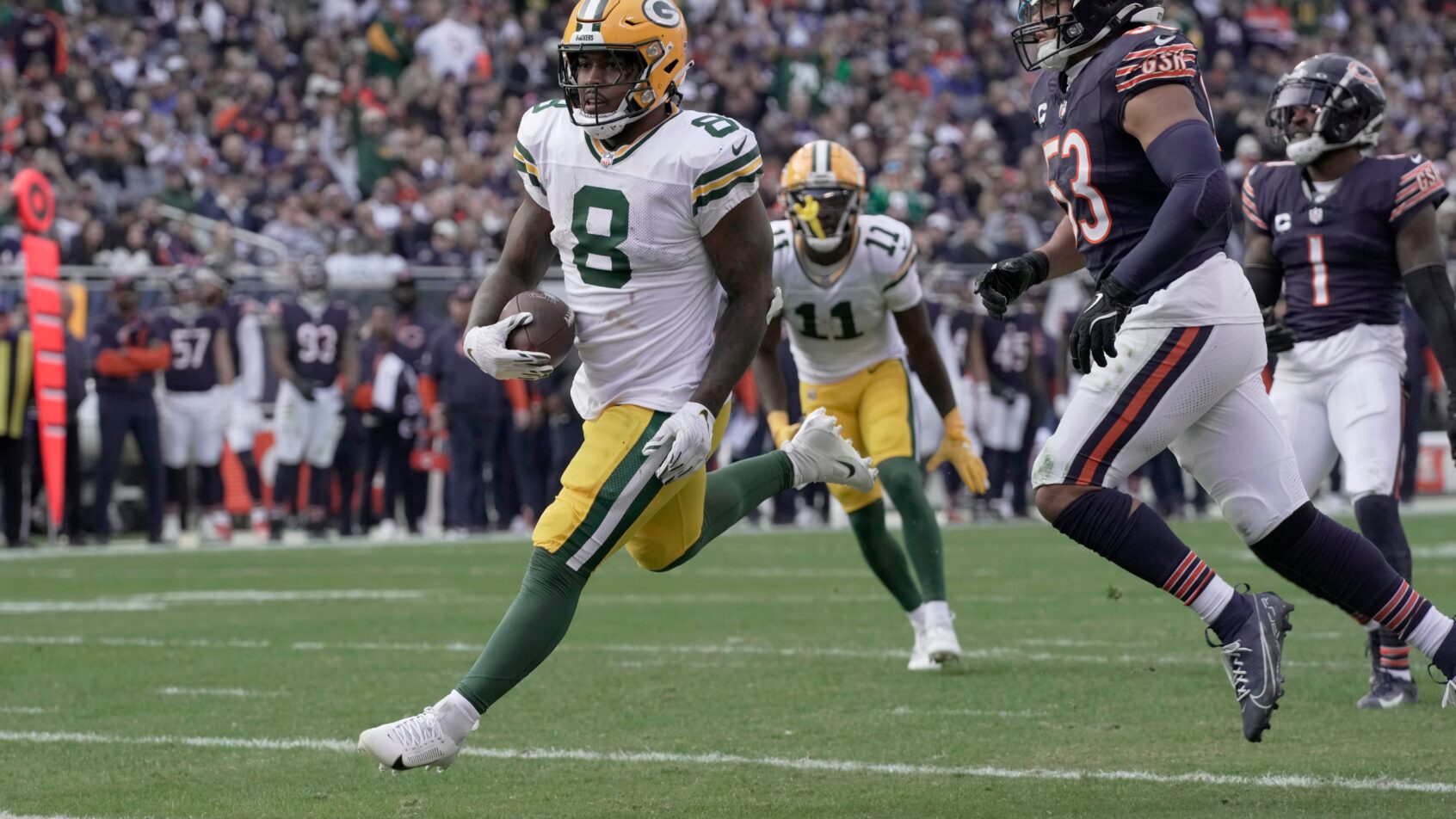 Green Bay Packers running back Josh Jacobs scores a TD against the Chicago Bears
