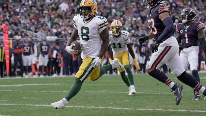 Green Bay Packers running back Josh Jacobs scores a TD against the Chicago Bears
