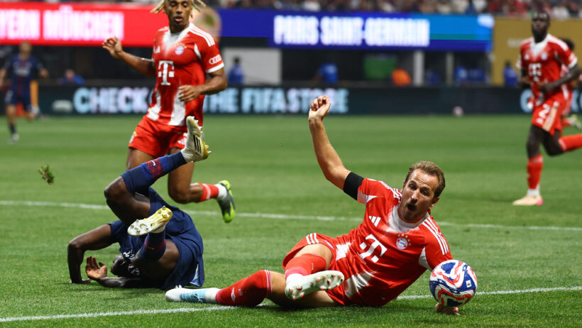 HARRY-KANE-ATACANTE-DO-BAYERN-DE-MUNIQUE-DIVIDE-COM-NUNO-MENDES-DO-PSG-DURANTE-PARTIDA-DO-MUNDIAL-DE-CLUBES