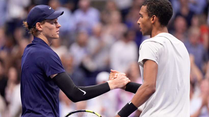Jannik Sinner shakes hands with Felix Auger-Aliassime
