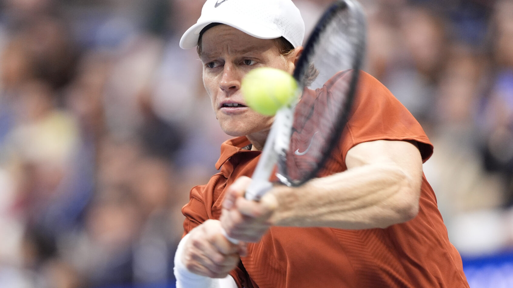 Jannik Sinner smacks a backhand in the US Open Final vs Carlos Alcaraz.