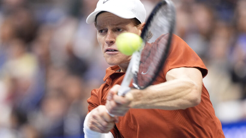 Jannik Sinner smacks a backhand in the US Open Final vs Carlos Alcaraz.