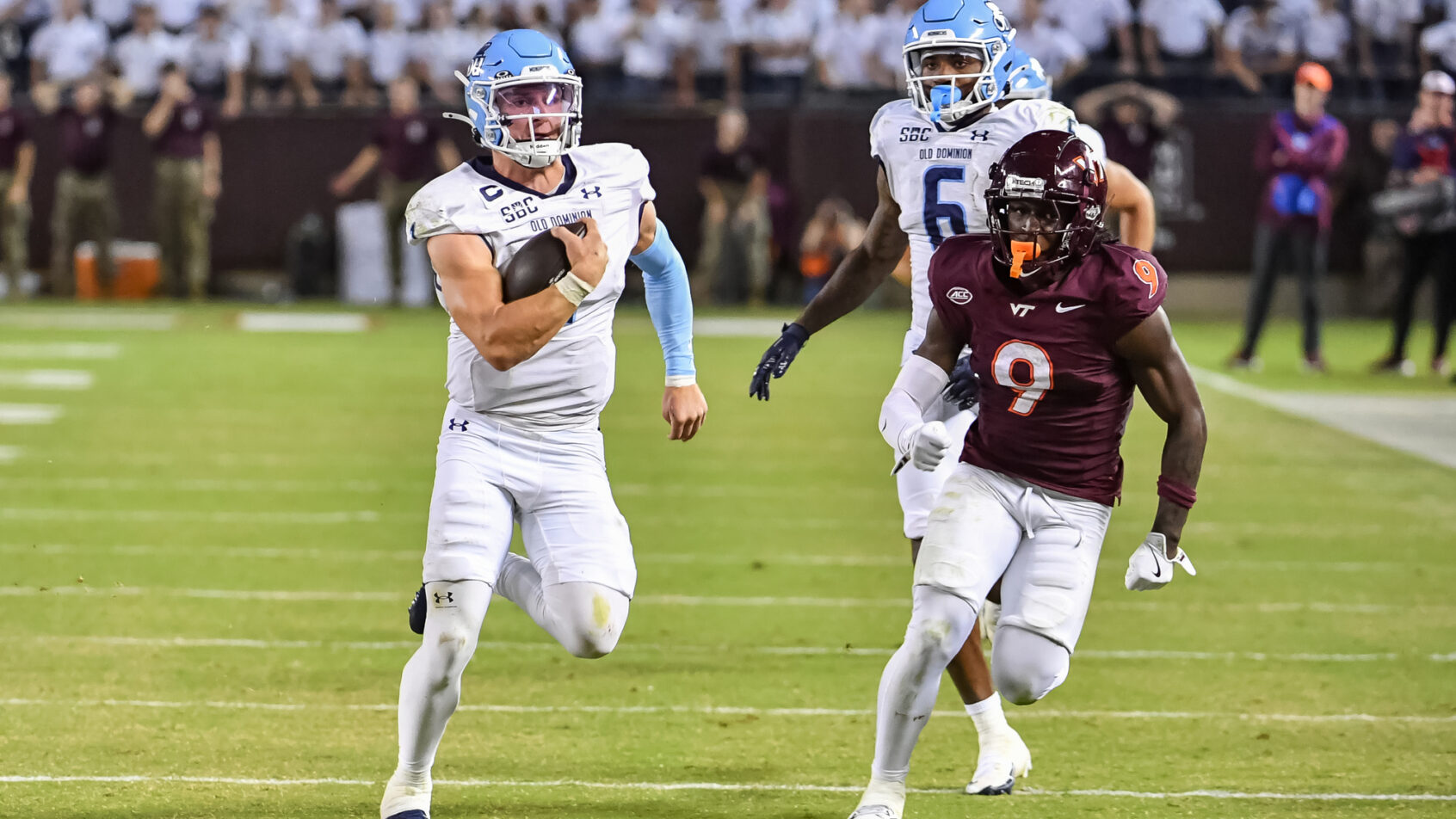 Colton Joseph runs away from a Virginia Tech defender.
