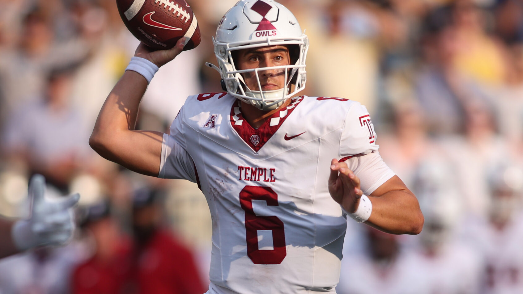 Temple Owls quarterback Evan Simon throws a pass