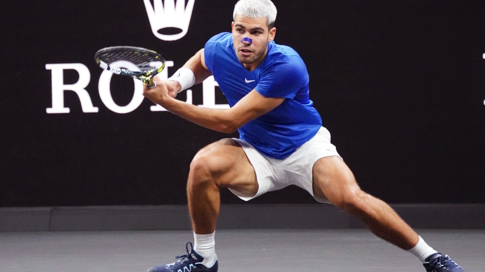 Carlos Alcaraz fires a backhand for Team Europe in Laver Cup action.