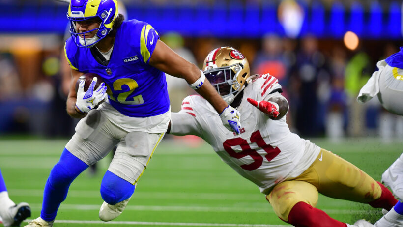Los Angeles Rams wide receiver Puka Nacua runs with the ball against the San Francisco 49ers
