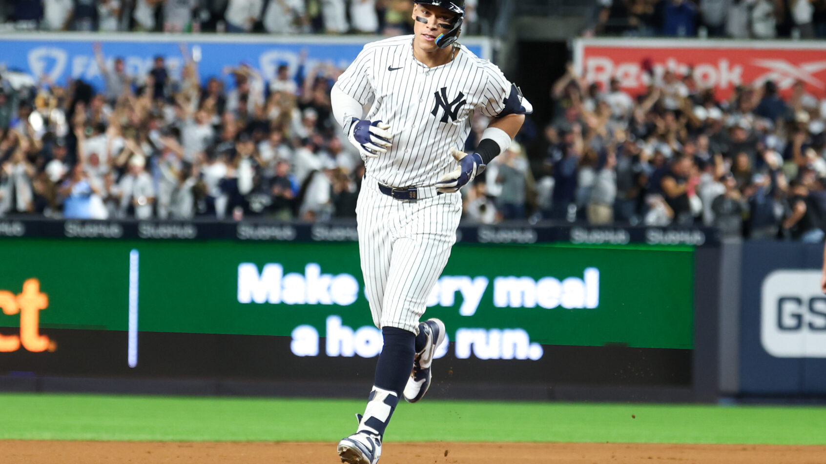 Aaron Judge rounds second base after a home run in the ALDS.