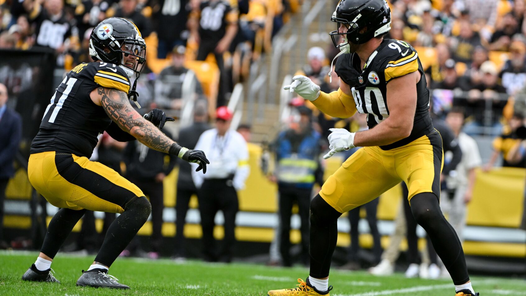 Pittsburgh Steelers outside linebacker T.J. Watt celebrates with linebacker Nick Herbig