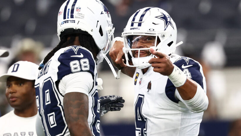 Dak Prescott and CeeDee Lamb celebrate prior to a game versus the Commanders.