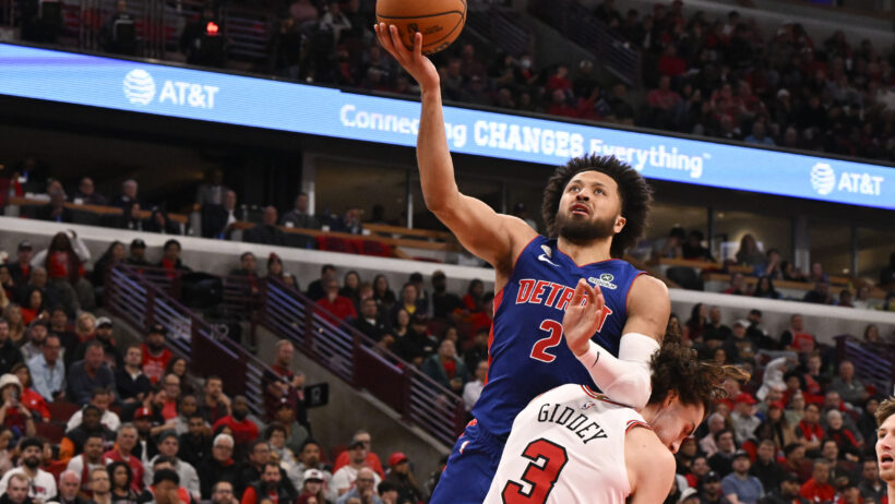 Detroit Pistons guard Cade Cunningham shoots over Chicago Bulls guard Josh Giddey