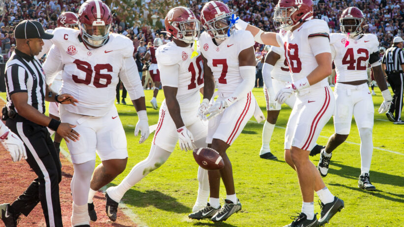 The Alabama defense celebrates an interception versus South Carolina.