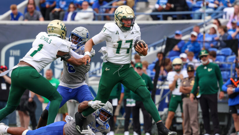 Byrum Brown scrambles for USF's offense.