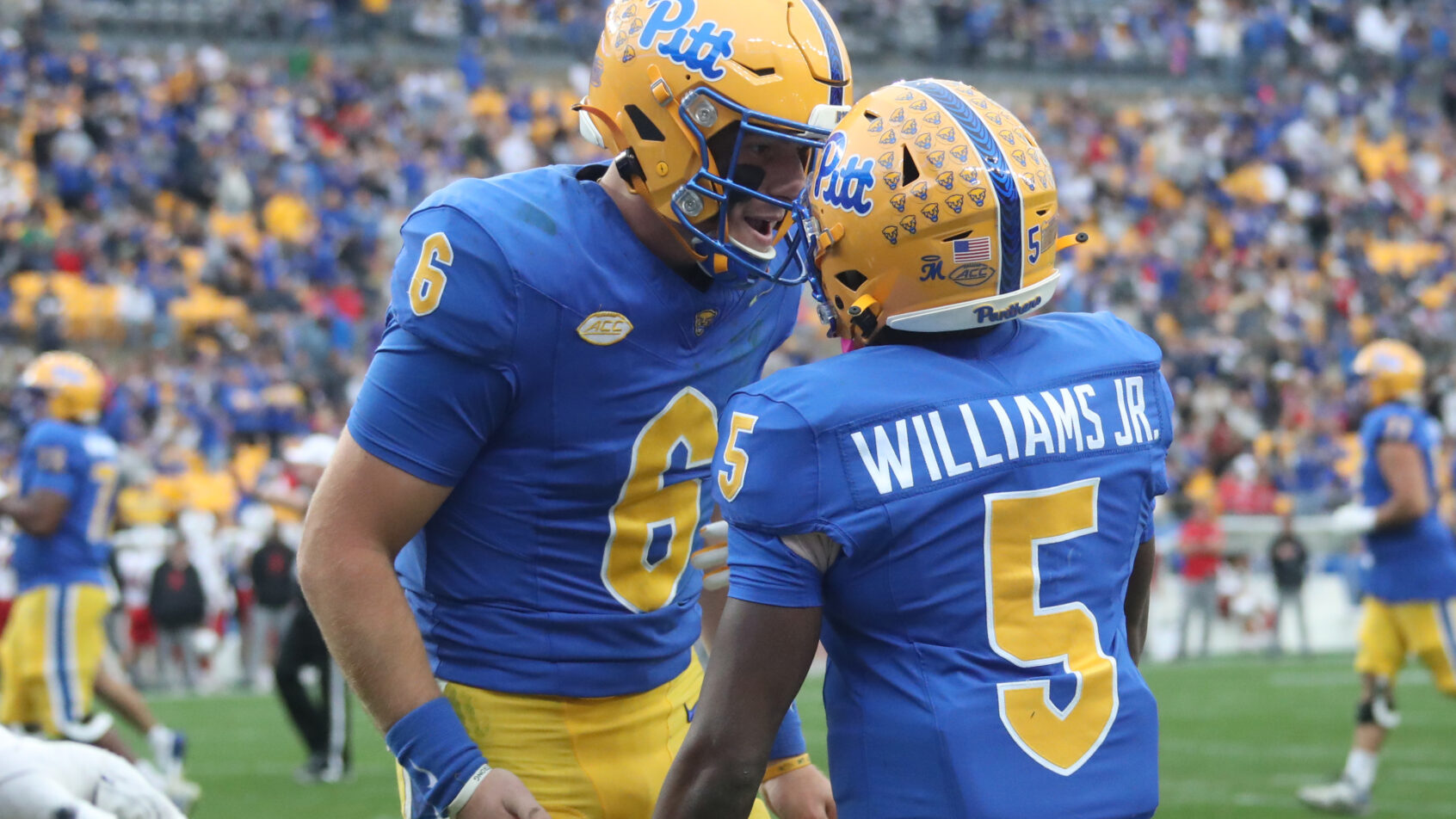 Mason Heintschel and Raphael Williams Jr. celebrate after a touchdown