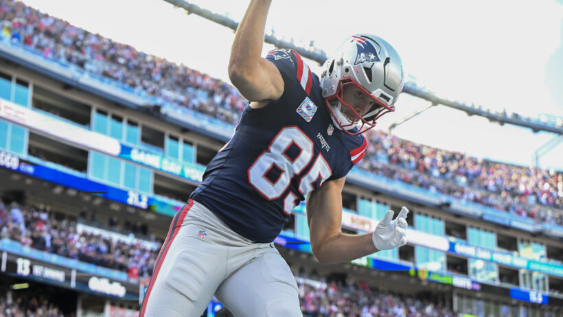 Hunter Henry spiking the ball after scoring a touchdown