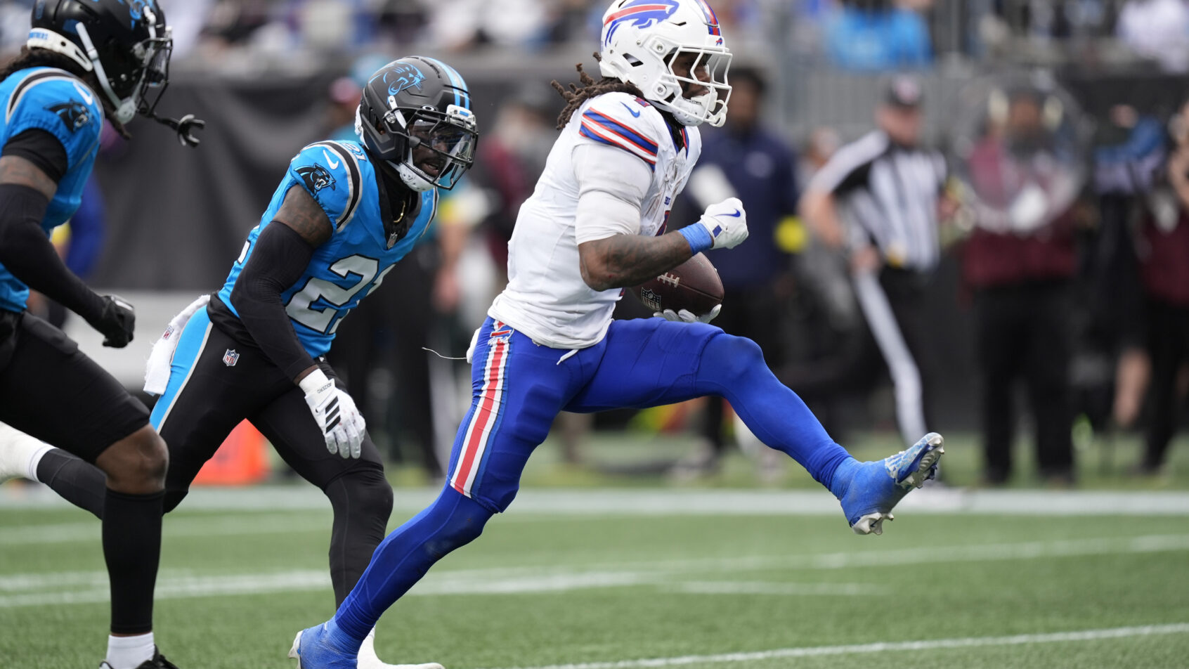 James Cook gallops into the end zone versus Carolina.