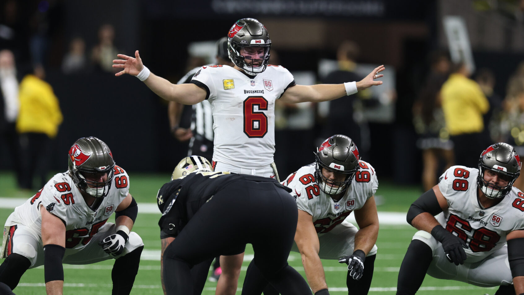 Tampa Bay Buccaneers quarterback Baker Mayfield directs traffic pre-snap