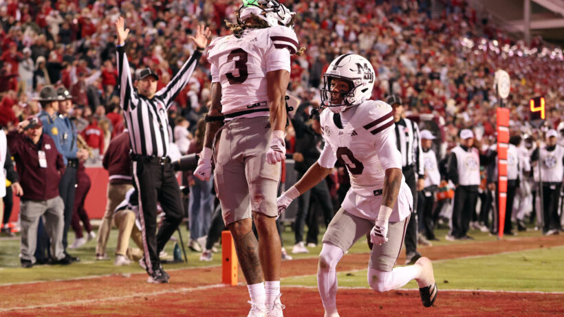 Anthony Evans III celebrating in the endzone after scoring a touchdown