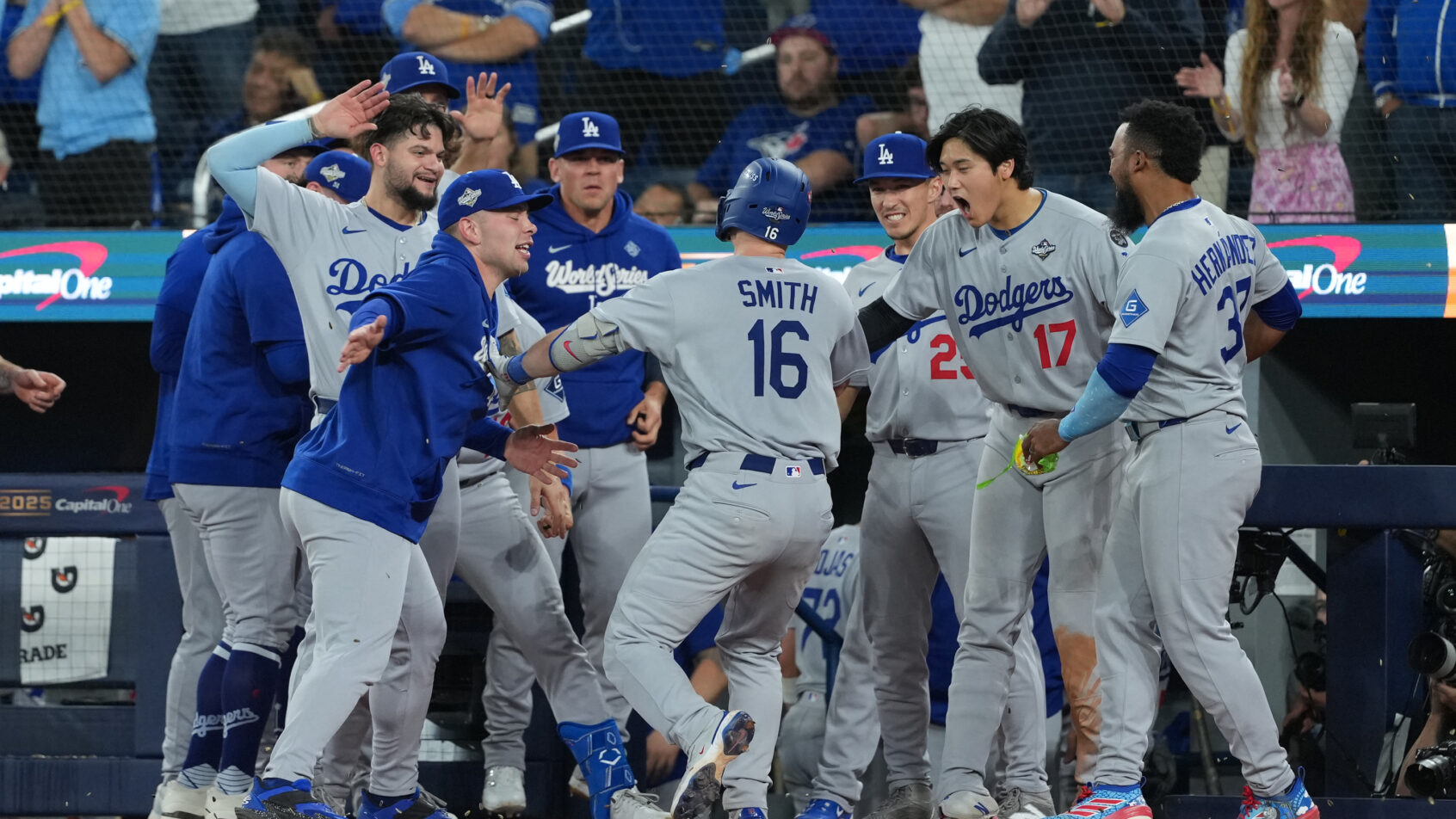 The LA Dodgers celebrate Will Smith's World Series winning home run.