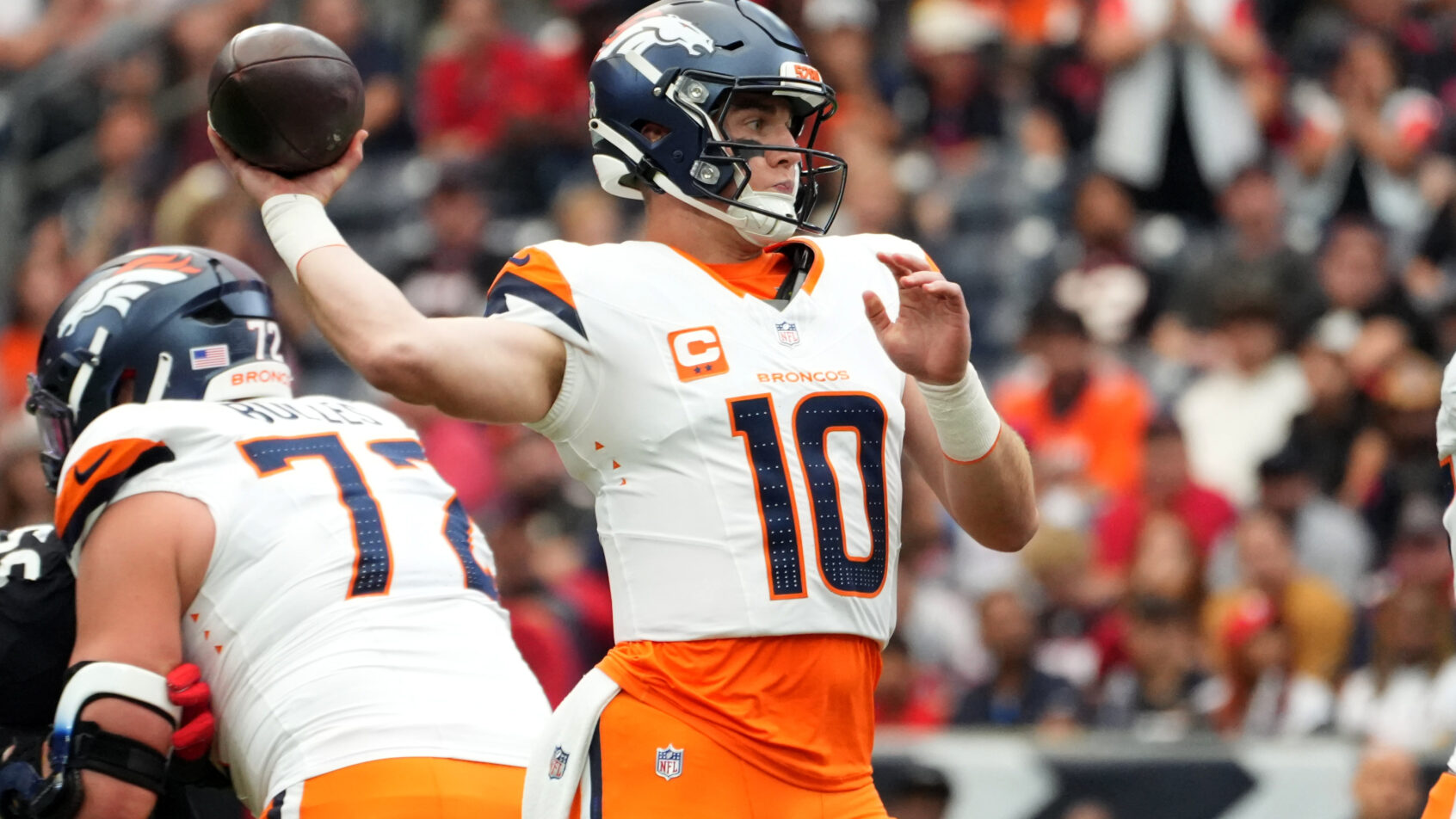Bo Nix drops back to pass versus the Texans.