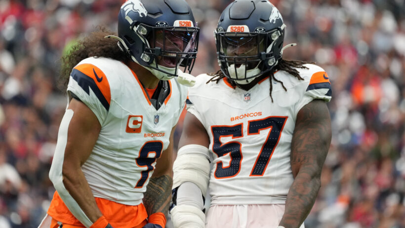The Broncos defense celebrates after a stand against the Texans.