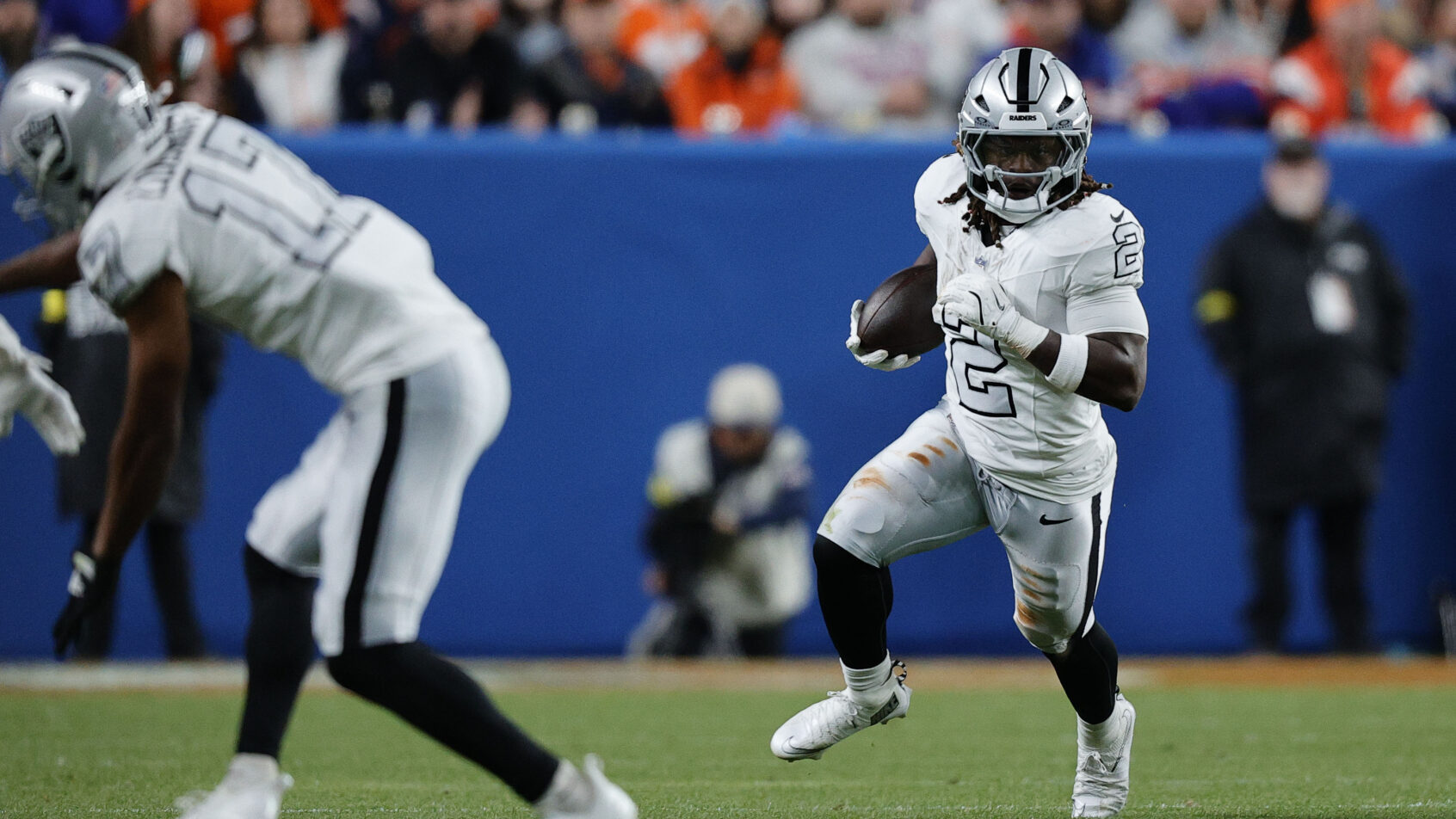 Ashton Jeanty carrying the ball