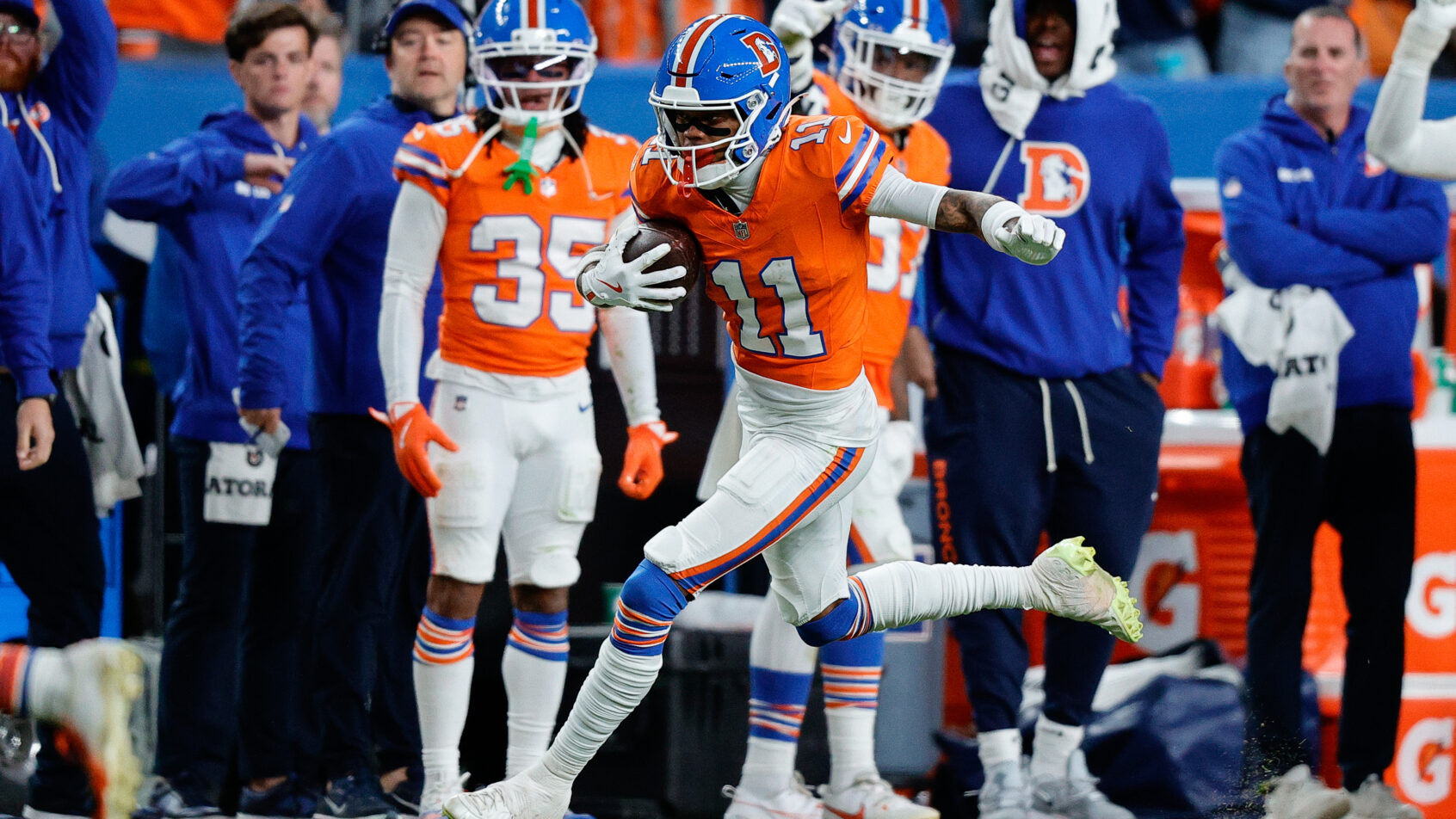 Troy Franklin running with the ball