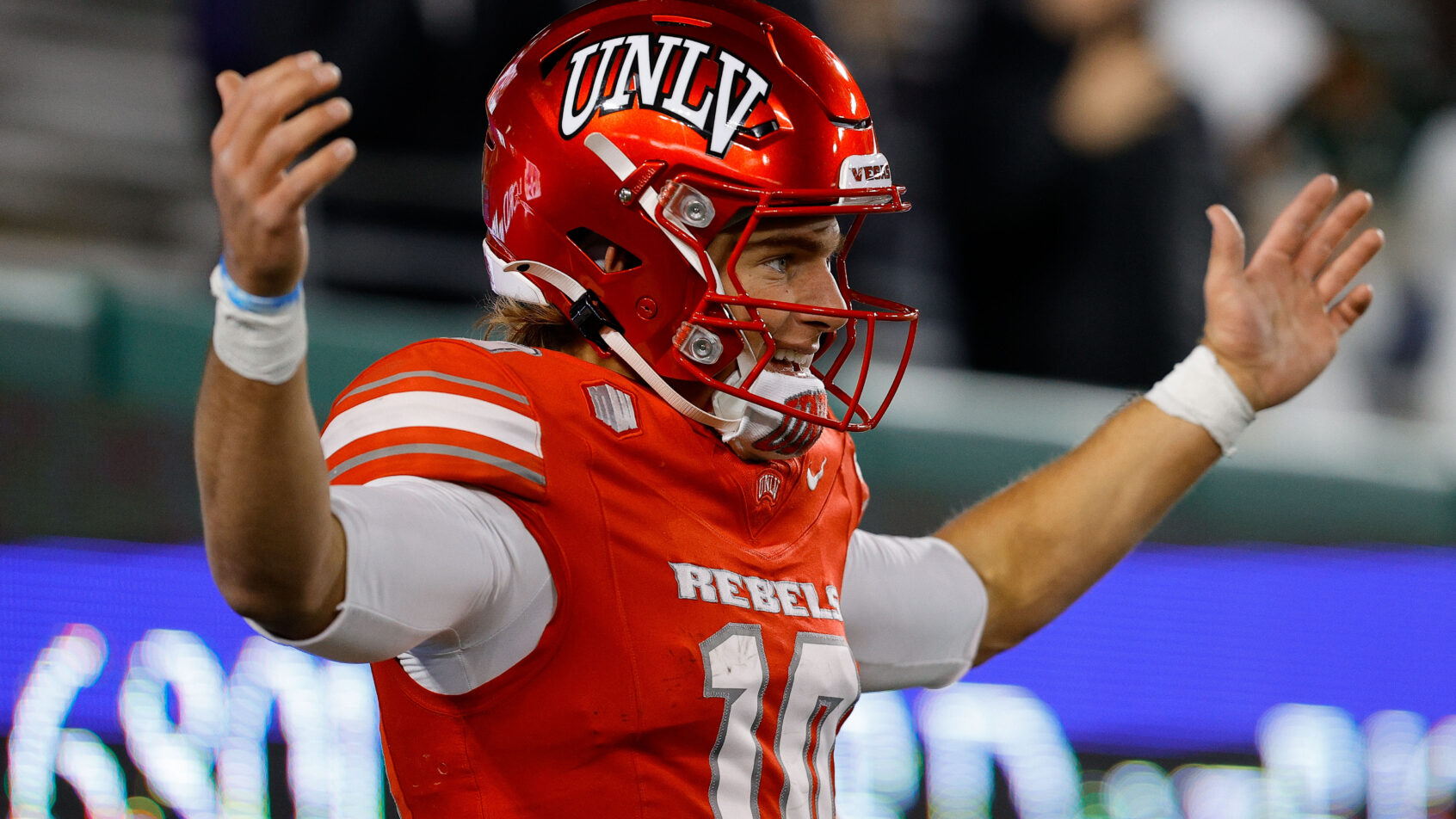 Anthony Colandrea celebrates a UNLV touchdown.