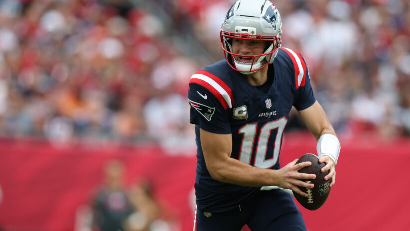 Drake Maye scrambles out of the pocket versus the Buccaneers.