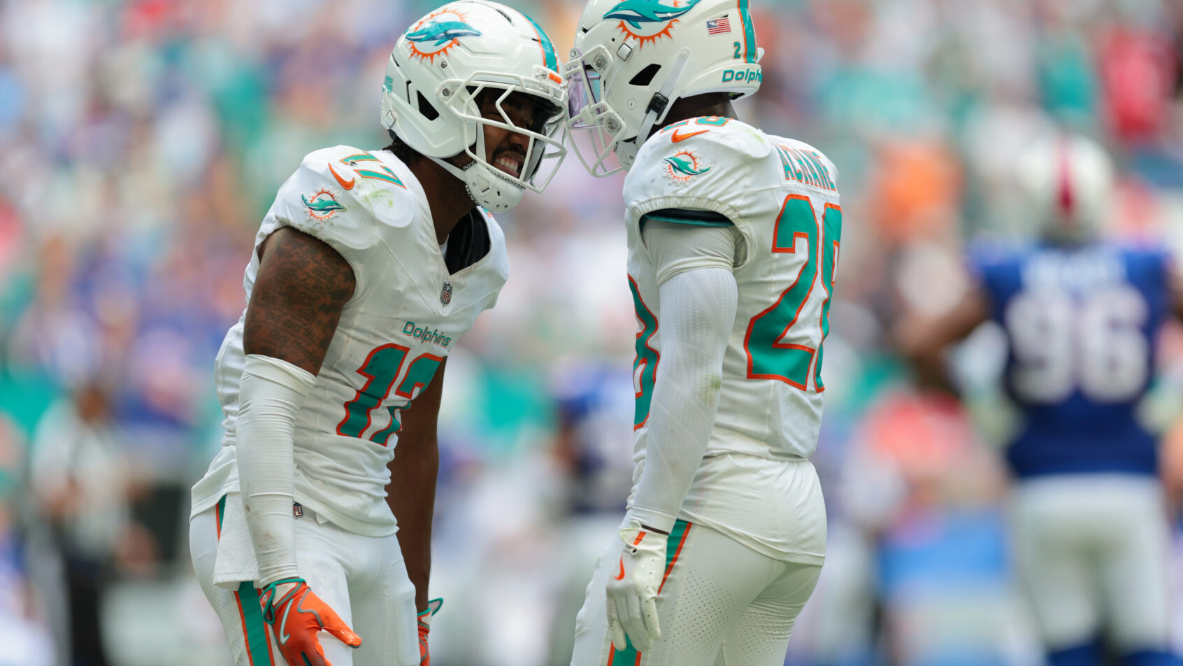 Miami Dolphins wide receiver Jaylen Waddle celebrates a TD with running back De'Von Achane