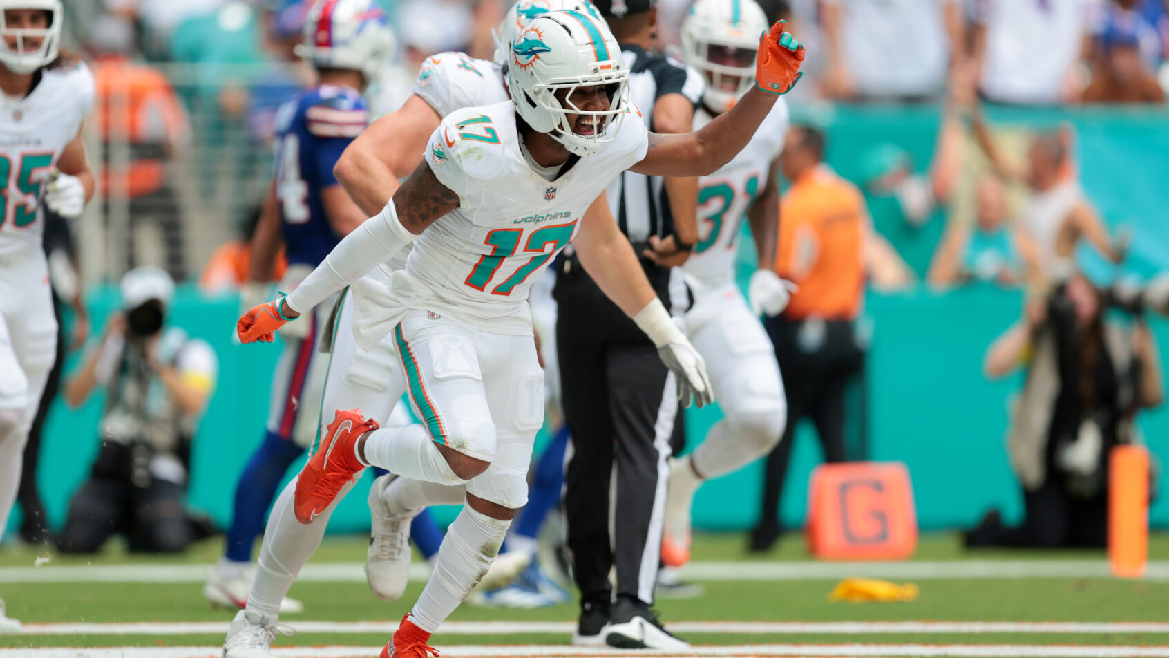 Jaylen Waddle celebrating after a touchdown