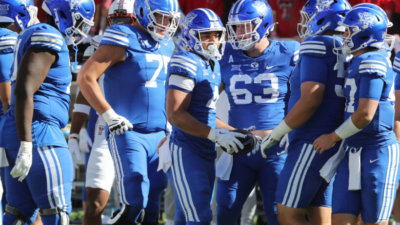 BYU's offense breaks the huddle in a game versus Texas Tech.