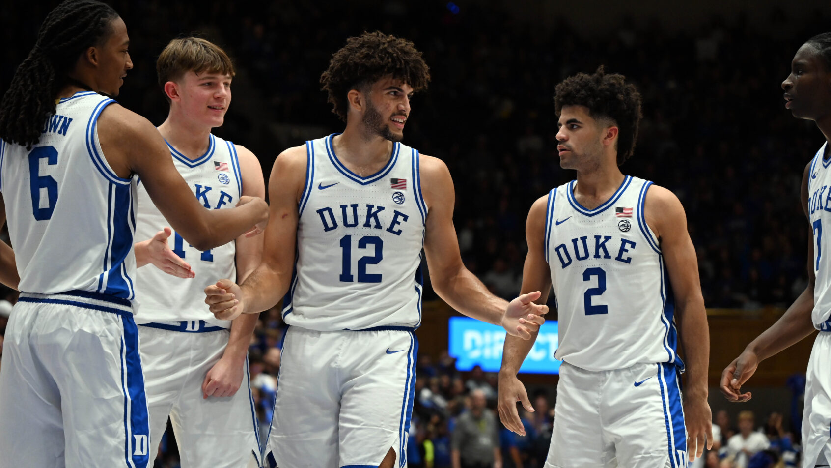 Duke Blue Devils forward Cameron Boozer high fives teammates after a basket