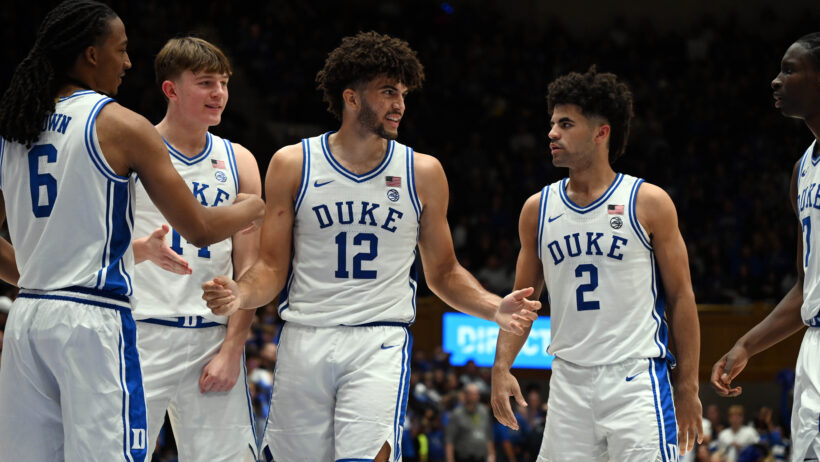 Duke Blue Devils forward Cameron Boozer high fives teammates after a basket