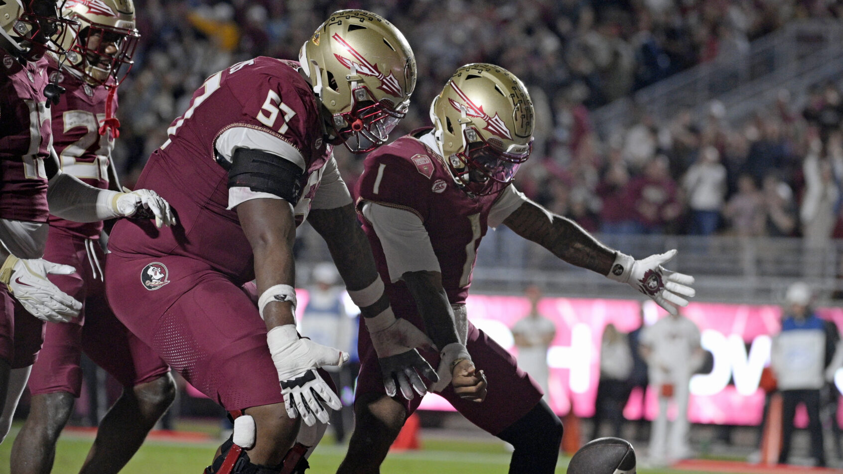 Tommy Castellanos celebrates a touchdown versus Virginia Tech.