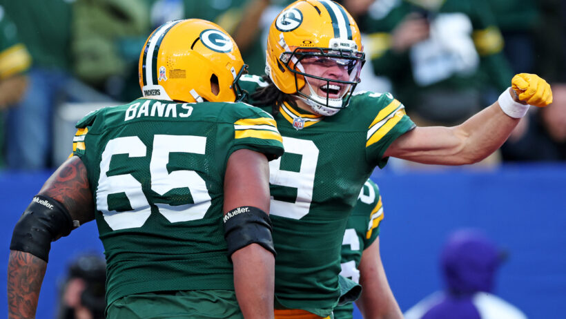 Christian Watson celebrating after a touchdown
